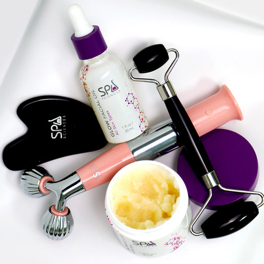 A set of Contour & Glow beauty products by Spa Sciences on a white plate.