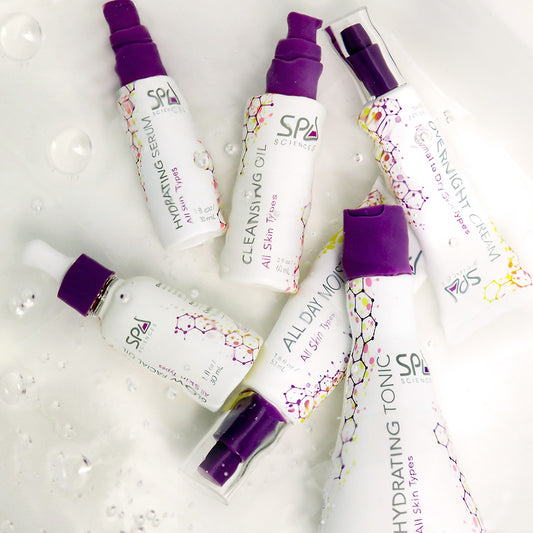 Spa Sciences Hydration Hero skin care products in a bath tub.