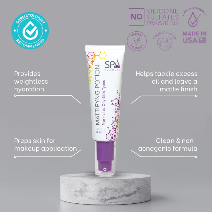 A tube of Spa Sciences' Acne Attack Bundle on a marble table.