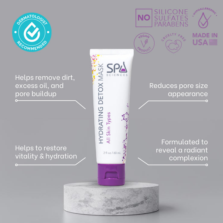 A tube of Spa Sciences Hydrating Detox Mask on a marble table helps reduce pore size, promoting a healthy glow.