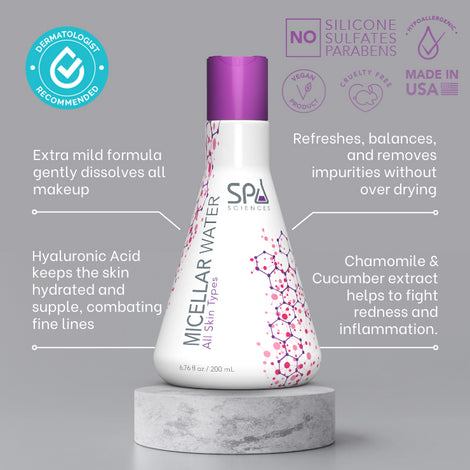 A bottle of Spa Sciences' Micellar Water on a marble base for skin.