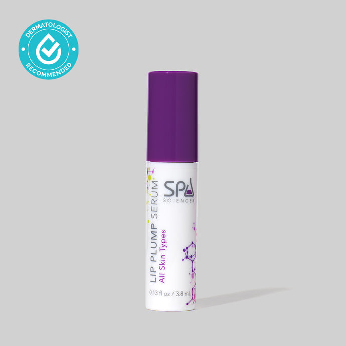 A tube of Spa Sciences Lip Plump Serum on a grey background.
