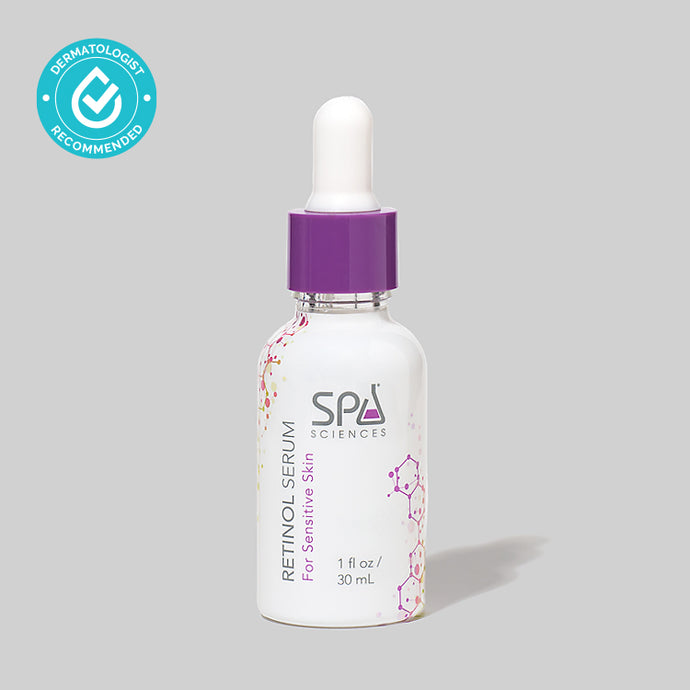 A bottle of Spa Sciences' Retinol Serum for wrinkles on a grey background.