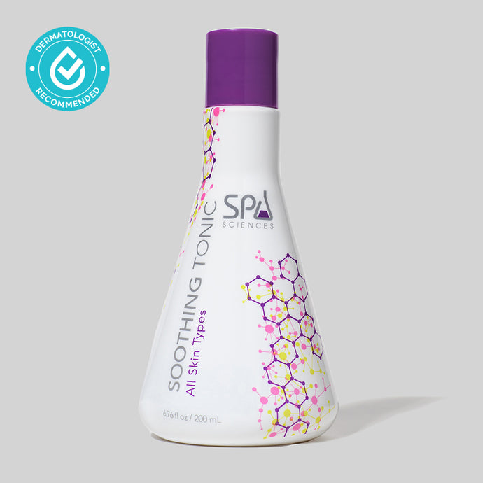 A bottle of Spa Sciences soothing tonic on a grey background, designed to re-balance the skin.