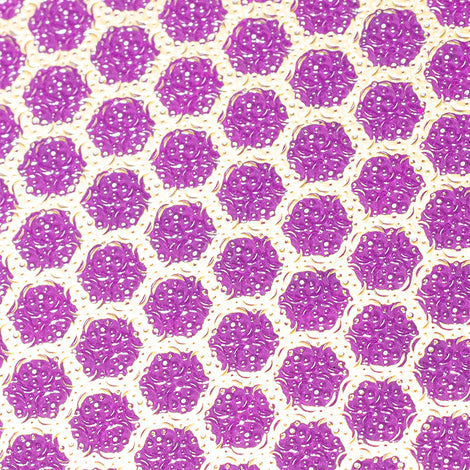 A close up of a Spa Sciences NANO FOOT FILE with a purple and gold pattern.