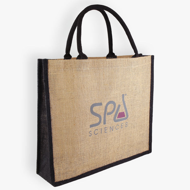 A Spa Sciences Eco-Friendly Tote Bag with a logo featuring natural ingredients.