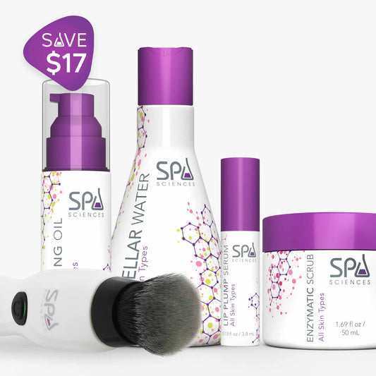 Makeup Guru products with a brush and a bottle of water from Spa Sciences.