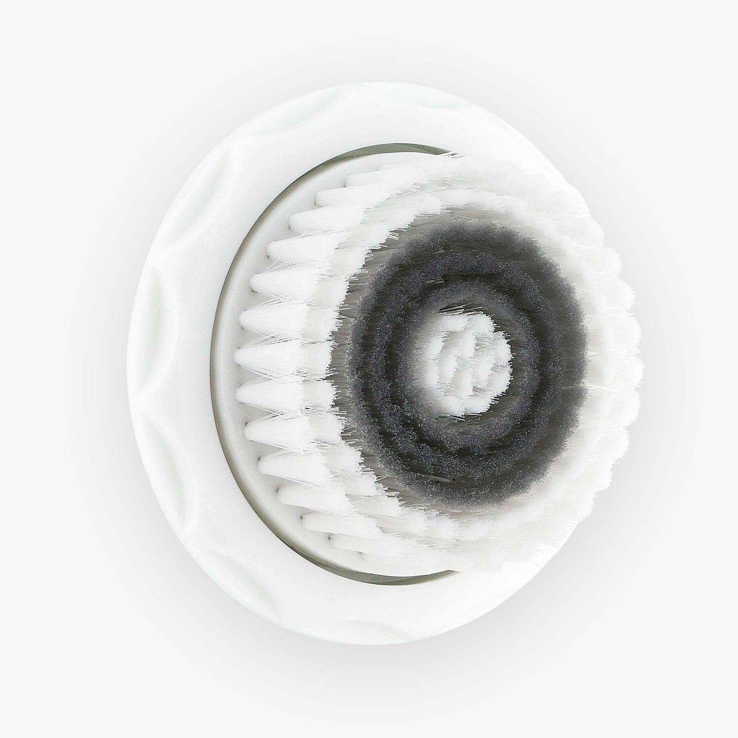 A white Spa Sciences NOVA Replacement Antimicrobial Cleansing Brush Head on a white surface.
