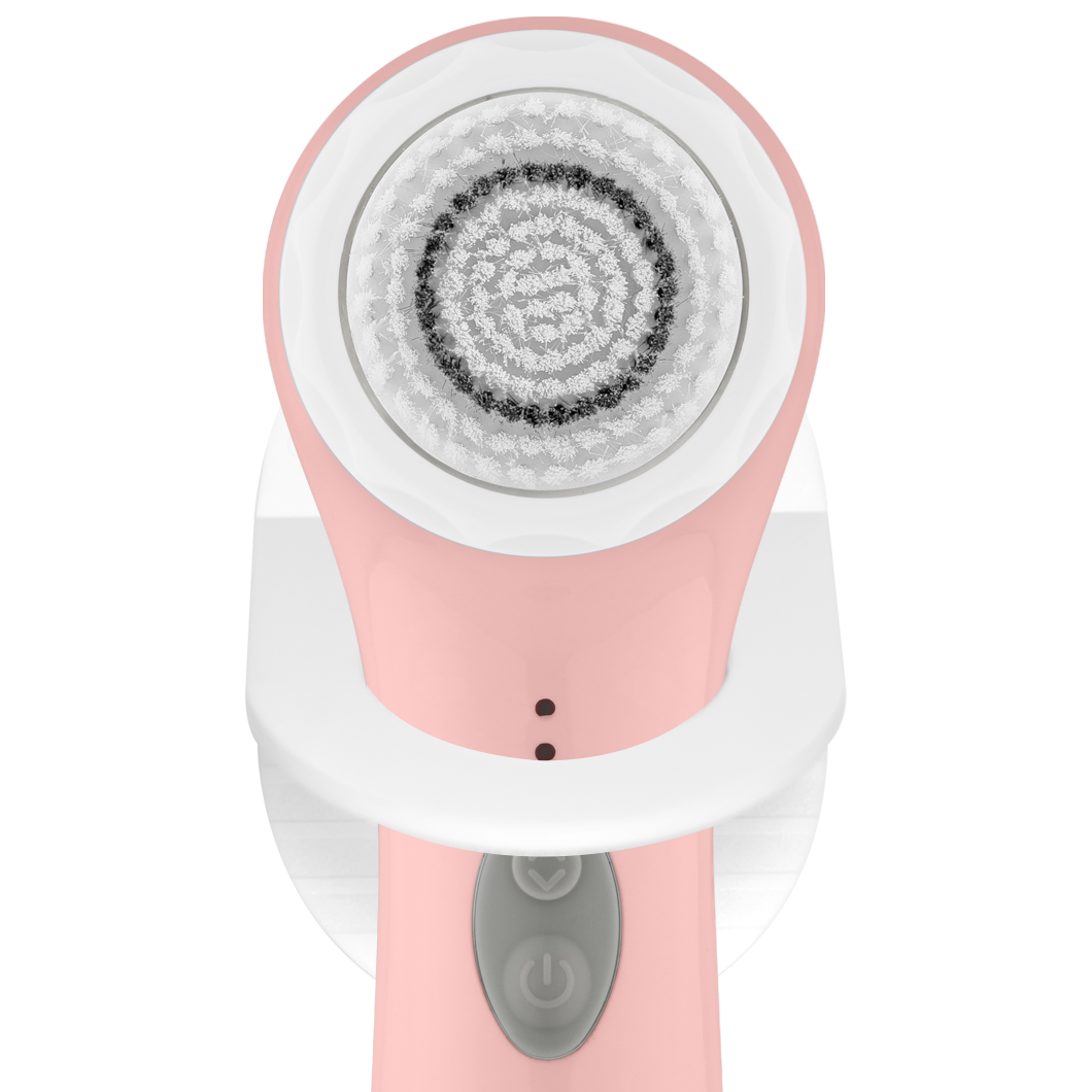 An electric Spa Sciences NOVA Shower Caddy in pink and white on a white background.