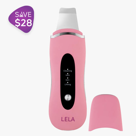 A high-quality pink Spa Sciences lela electric shaver with a pink handle.