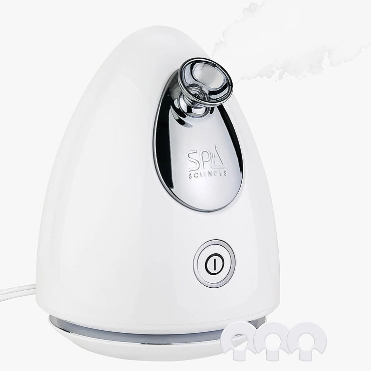 A white steamer with a Spa Sciences 'Perfect Pores' Set attached to it.